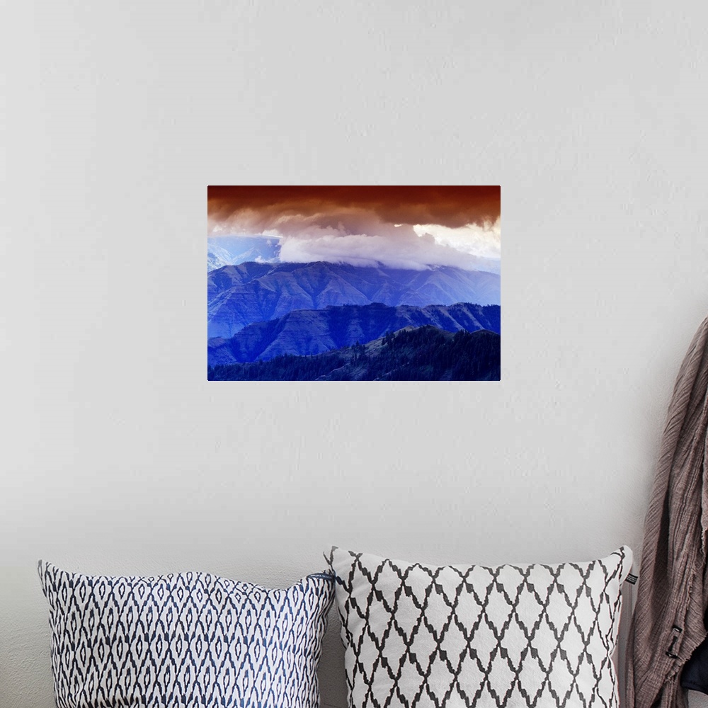 A bohemian room featuring Storm Clouds Over Hells Canyon