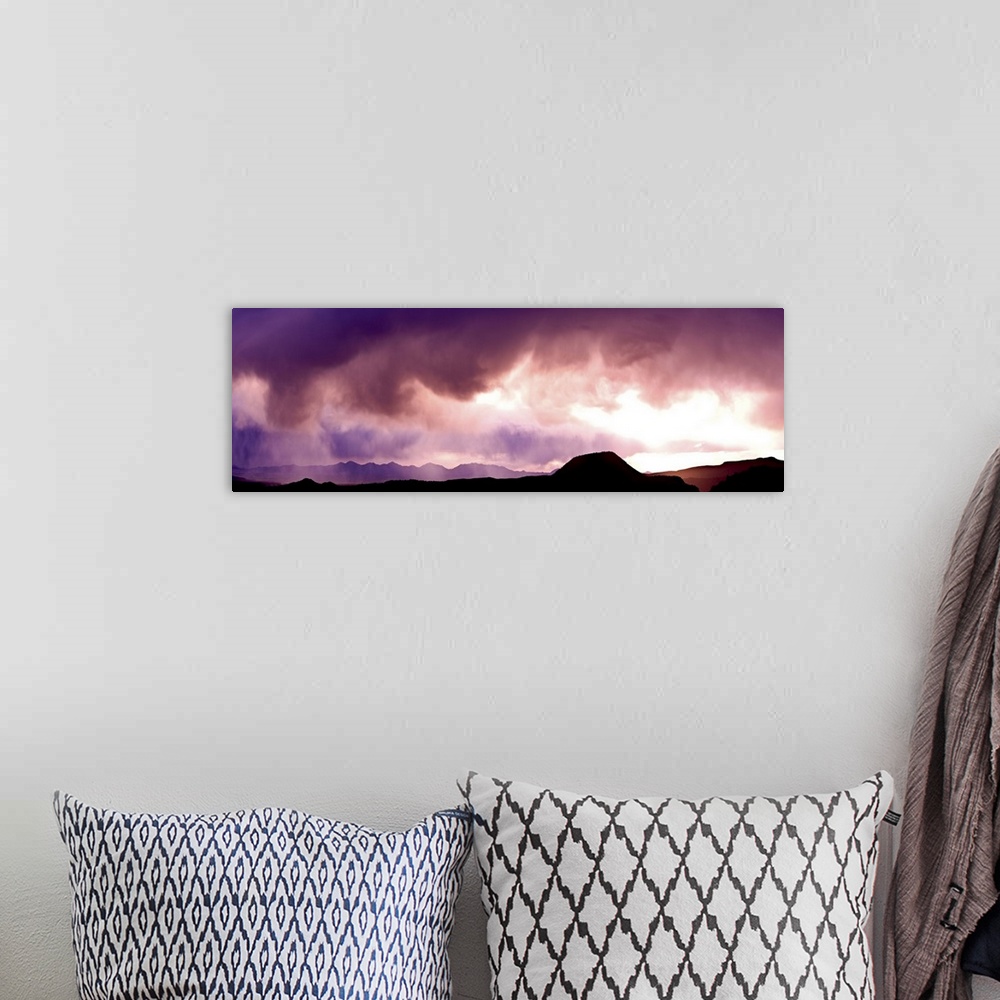 A bohemian room featuring Storm clouds over mountains, Sonoran Desert, Arizona