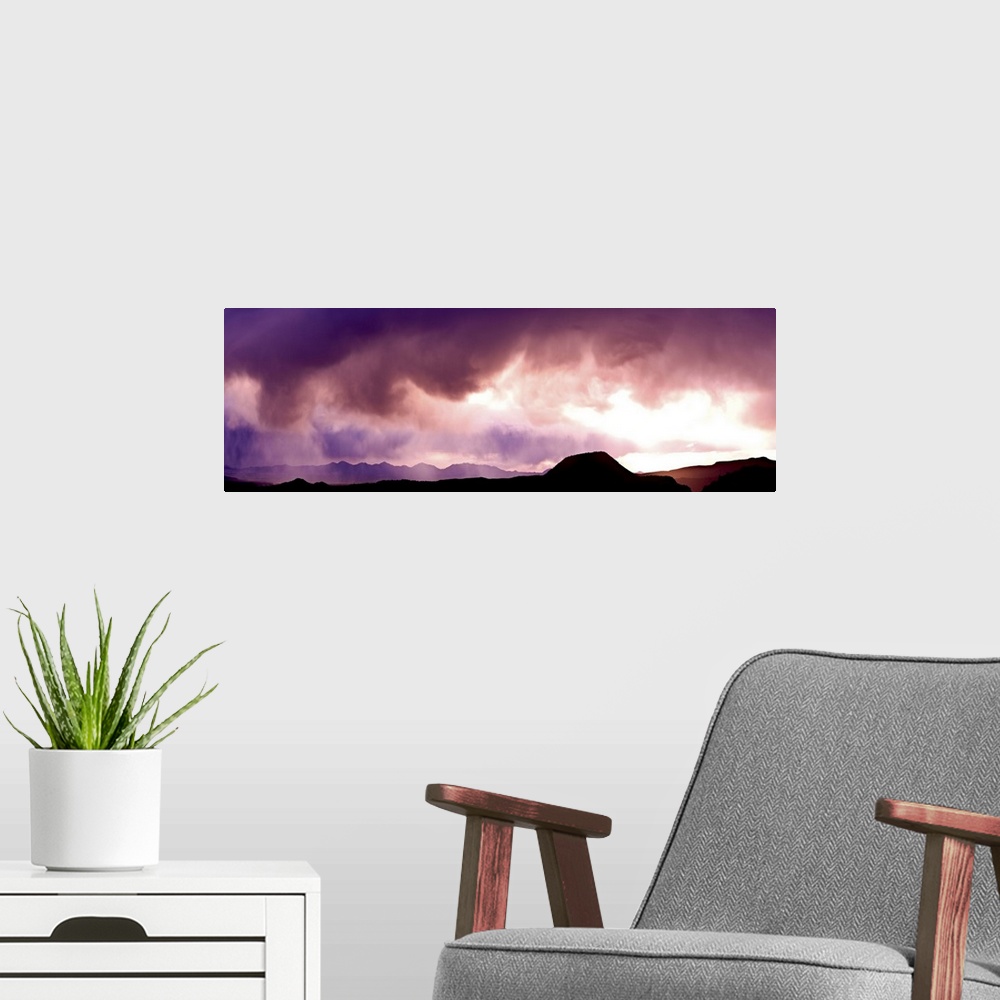 A modern room featuring Storm clouds over mountains, Sonoran Desert, Arizona