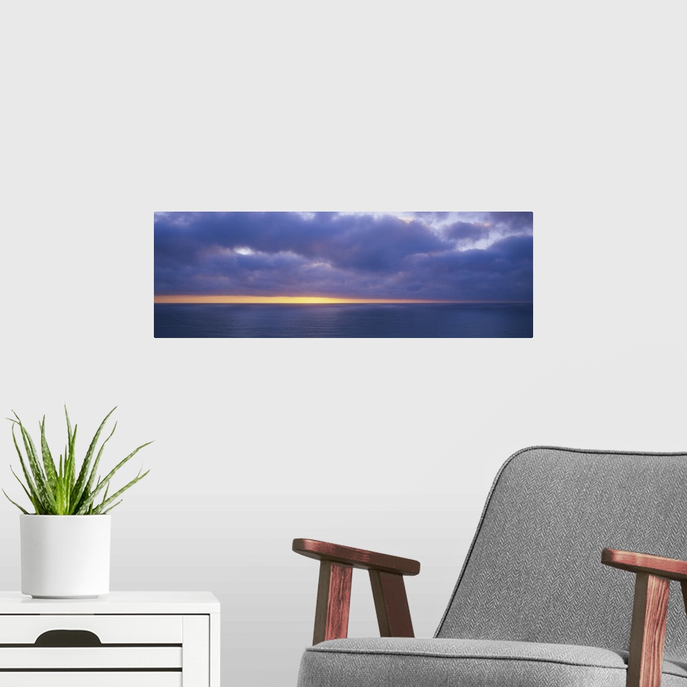 A modern room featuring Storm clouds over the sea, California