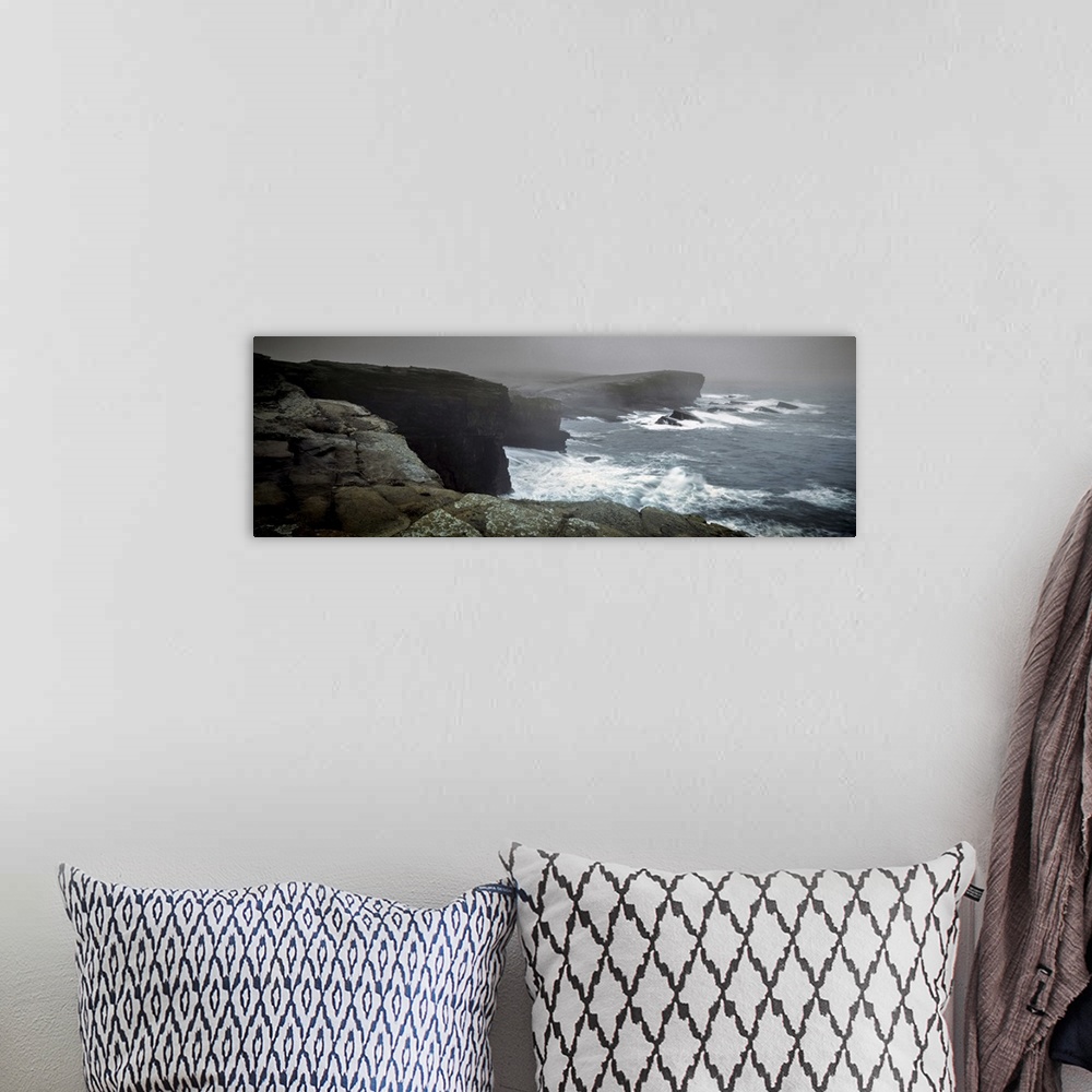 A bohemian room featuring Storms raging over Yesnaby Coastline, Orkney Islands, Scotland.