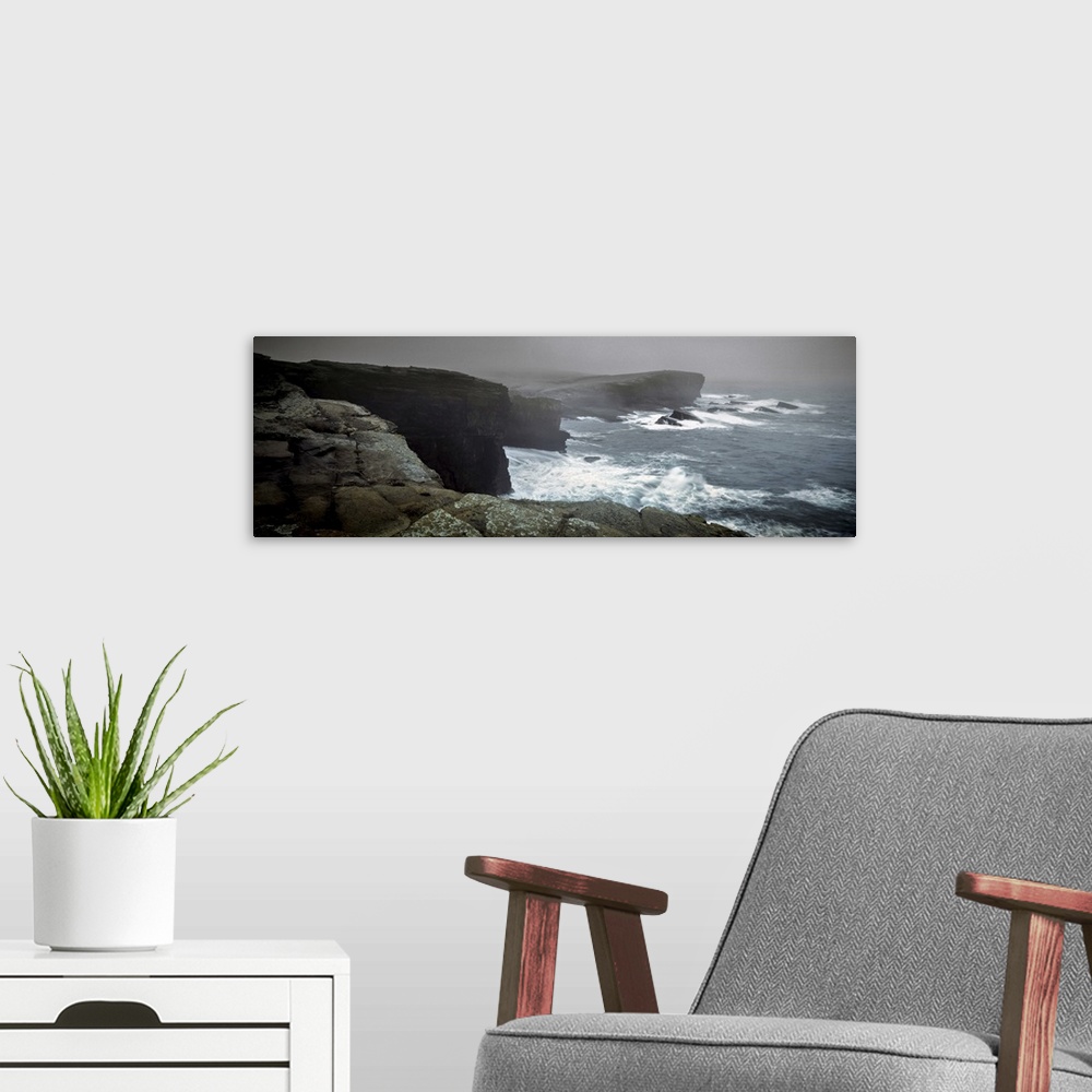 A modern room featuring Storms raging over Yesnaby Coastline, Orkney Islands, Scotland.