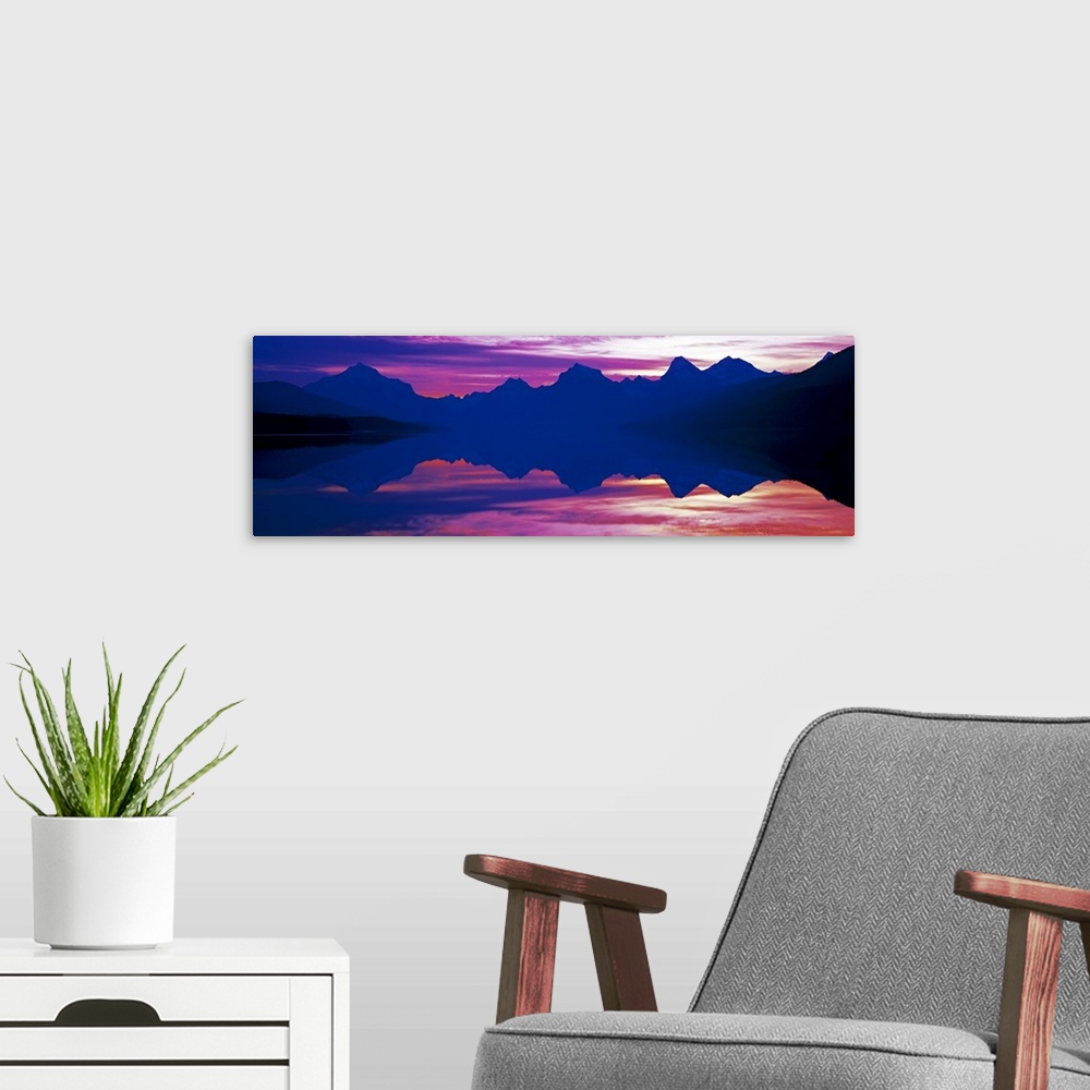 A modern room featuring Sunrise Lake McDonald Glacier National Park MT