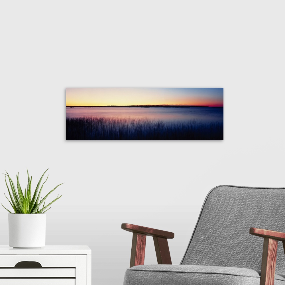 A modern room featuring Sunrise Lake Michigan WI