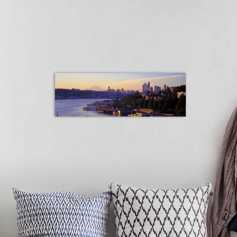A bohemian room featuring Dawn on the shoreline of a harbor in a Northwestern city, with the faint image Mount Rainier in t...