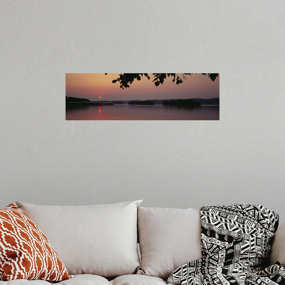 A bohemian room featuring Sunrise over a lake, Kentucky