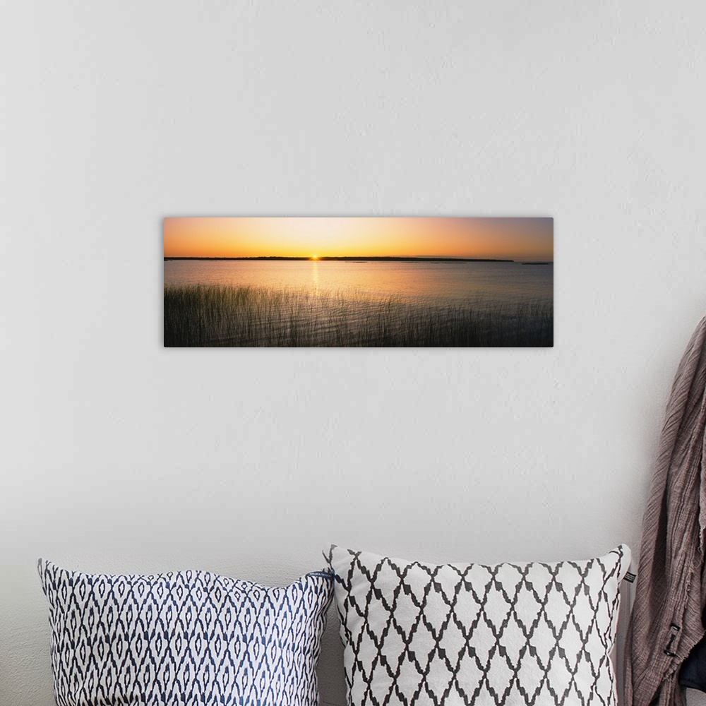 A bohemian room featuring Sunrise over a lake, North Bay, Lake Michigan, Door County, Wisconsin