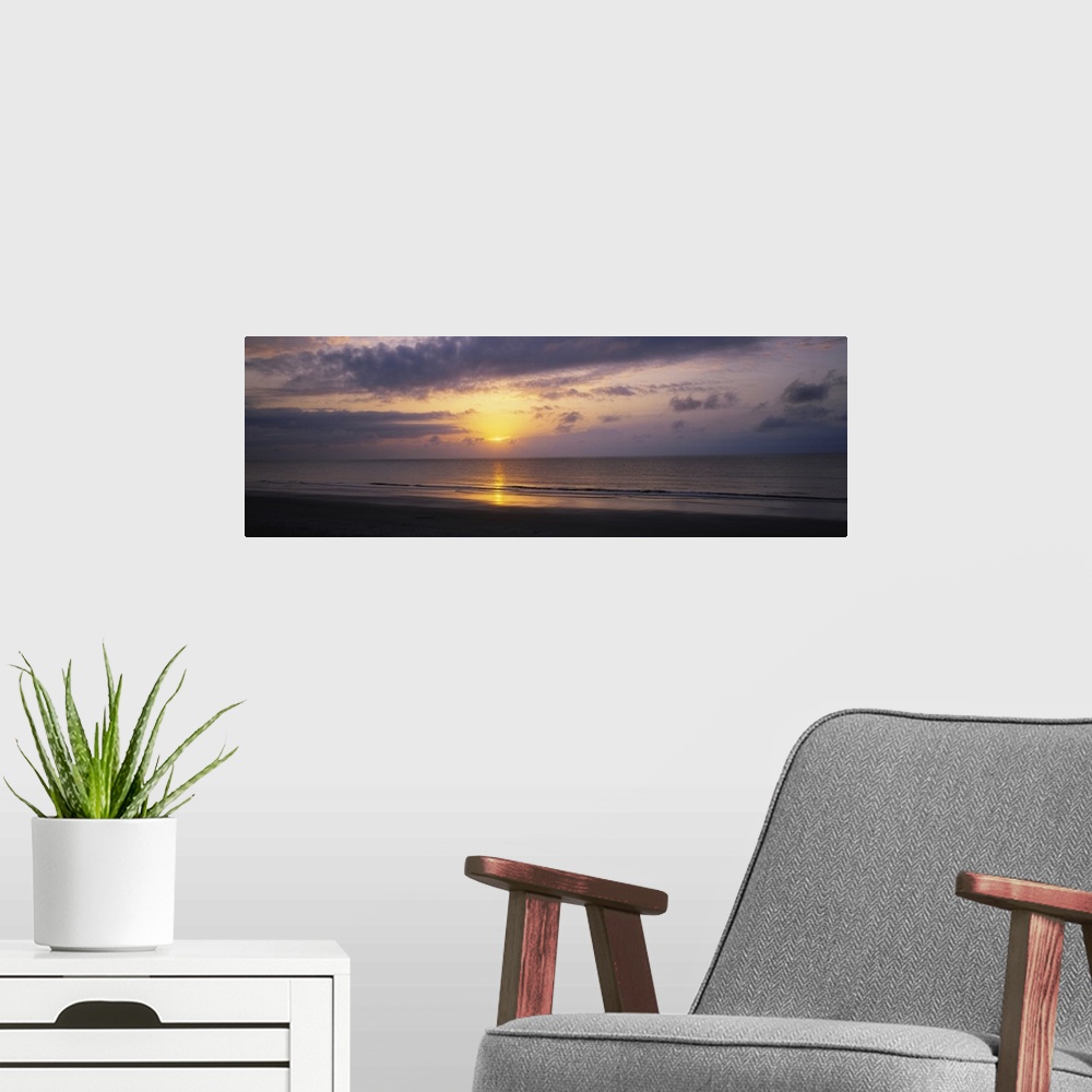 A modern room featuring Sunrise over the ocean, Jekyll Island, Georgia