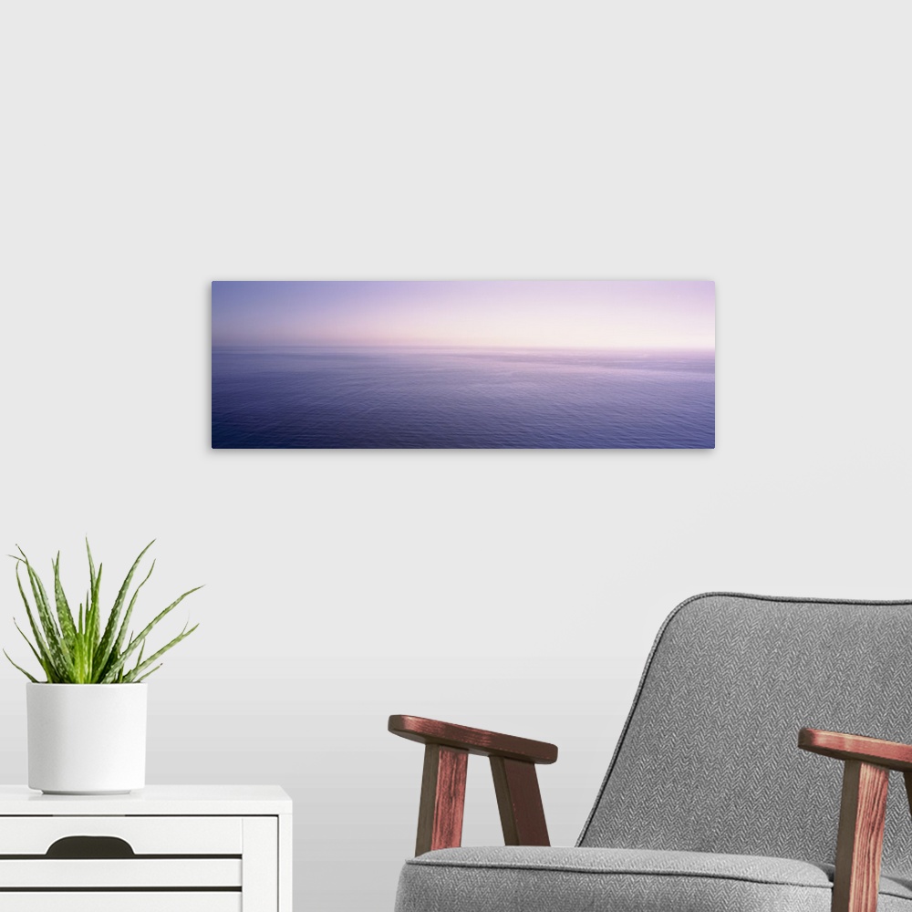 A modern room featuring Sunrise over the ocean, Pacific Ocean, California