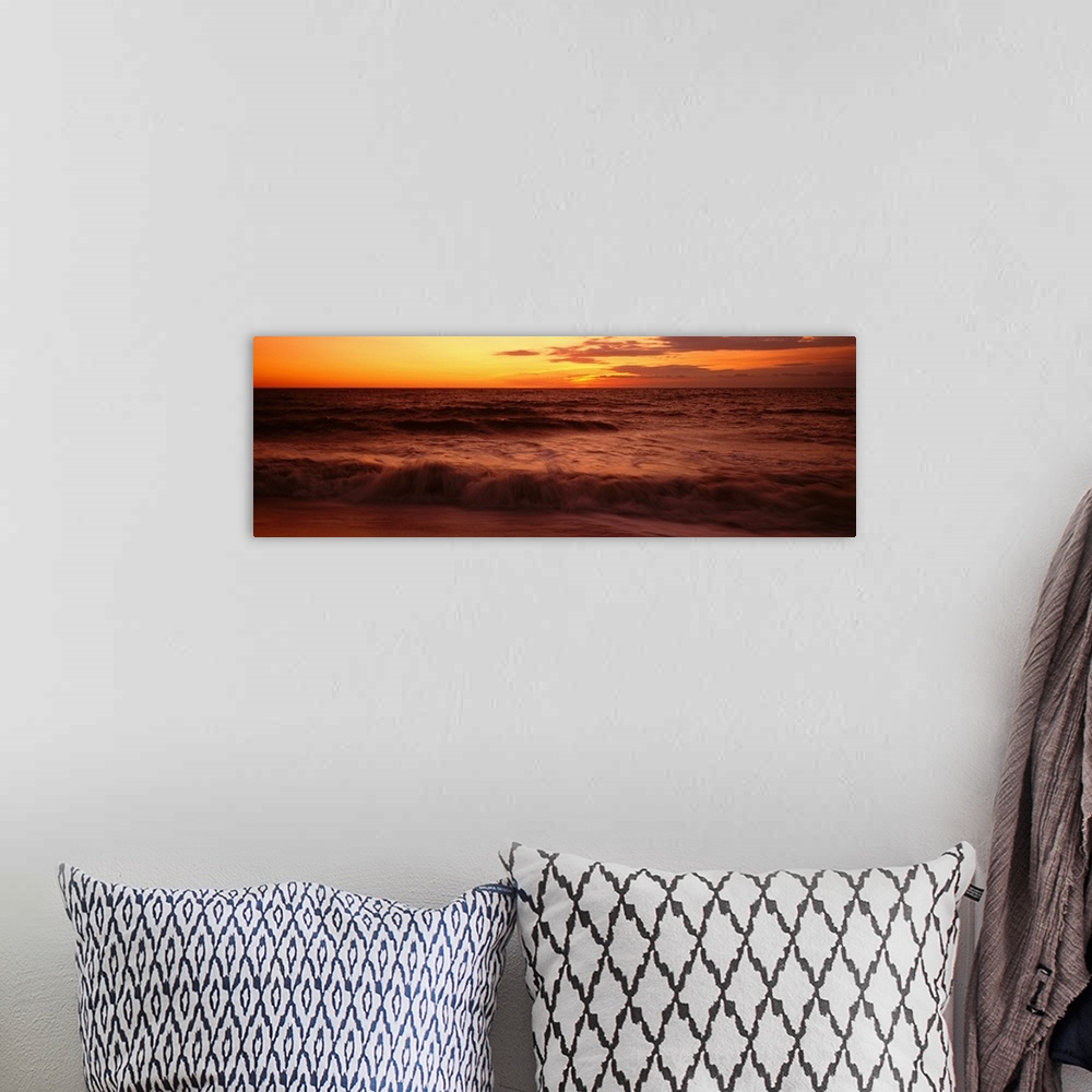 A bohemian room featuring Sunrise over the sea