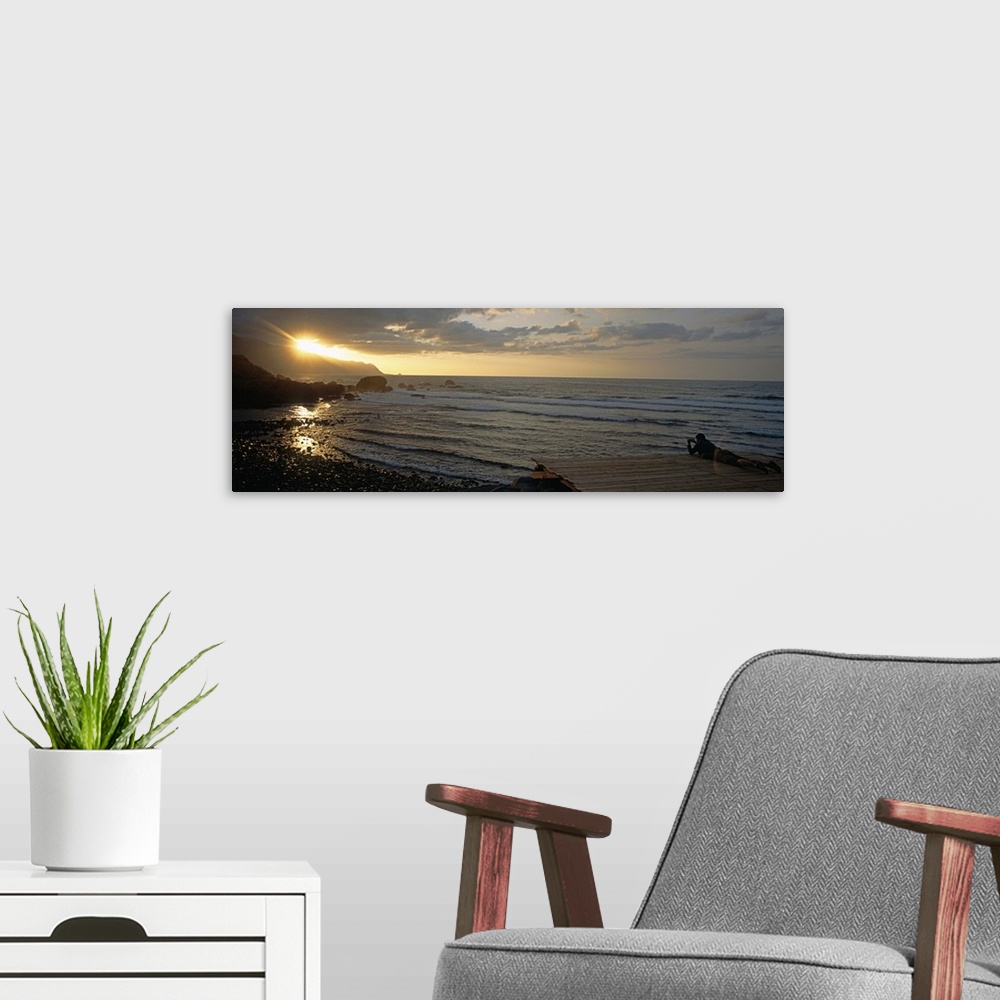 A modern room featuring Sunrise over the sea, Porto Moniz, Madeira, Portugal