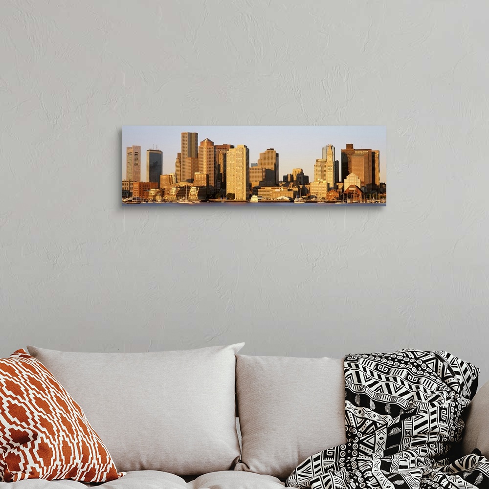 A bohemian room featuring Huge, panoramic photograph of the Boston skyline in the morning sun.