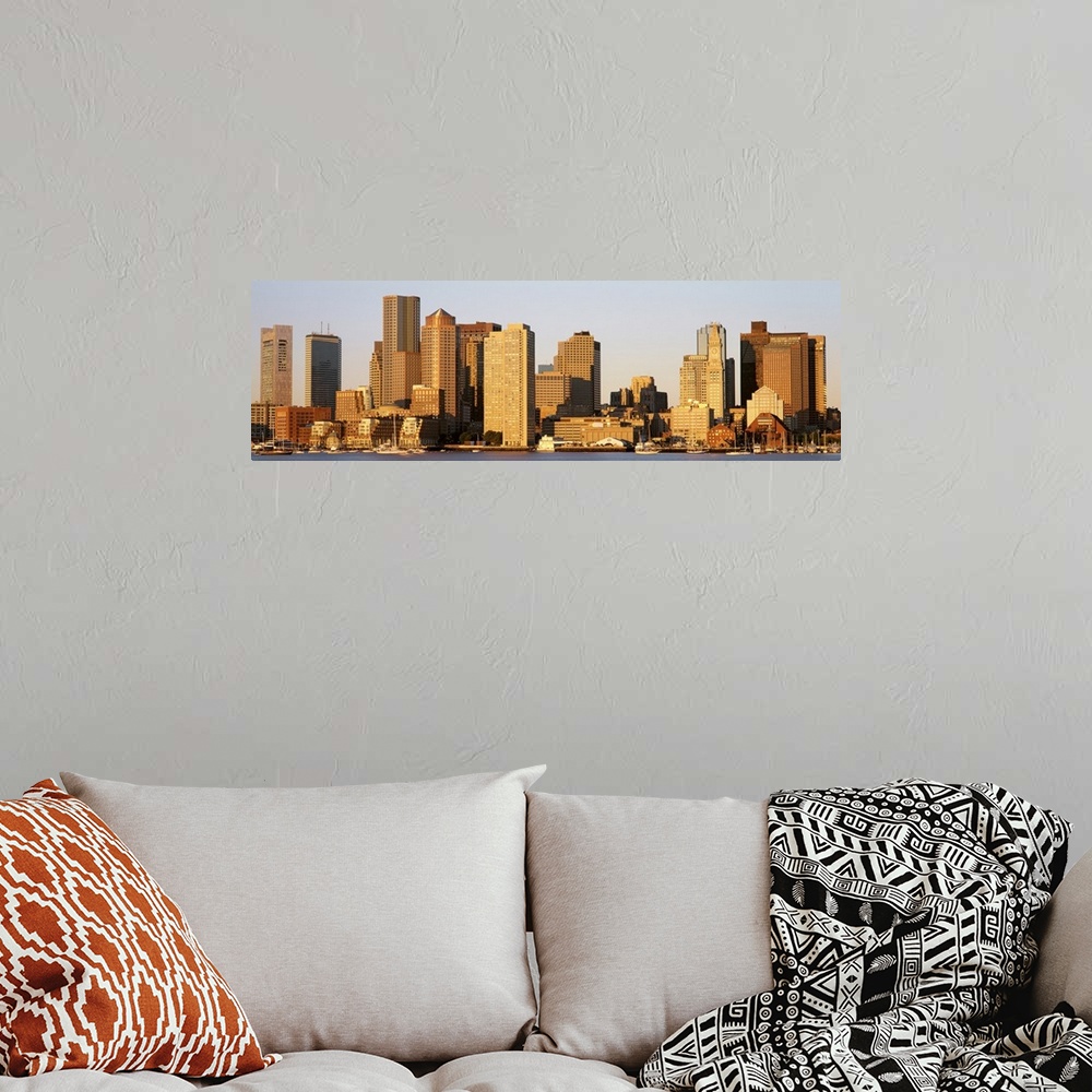 A bohemian room featuring Huge, panoramic photograph of the Boston skyline in the morning sun.