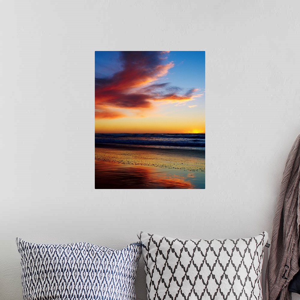 A bohemian room featuring Photograph of a cloudy beach sunset with gently rolling waves in the distant