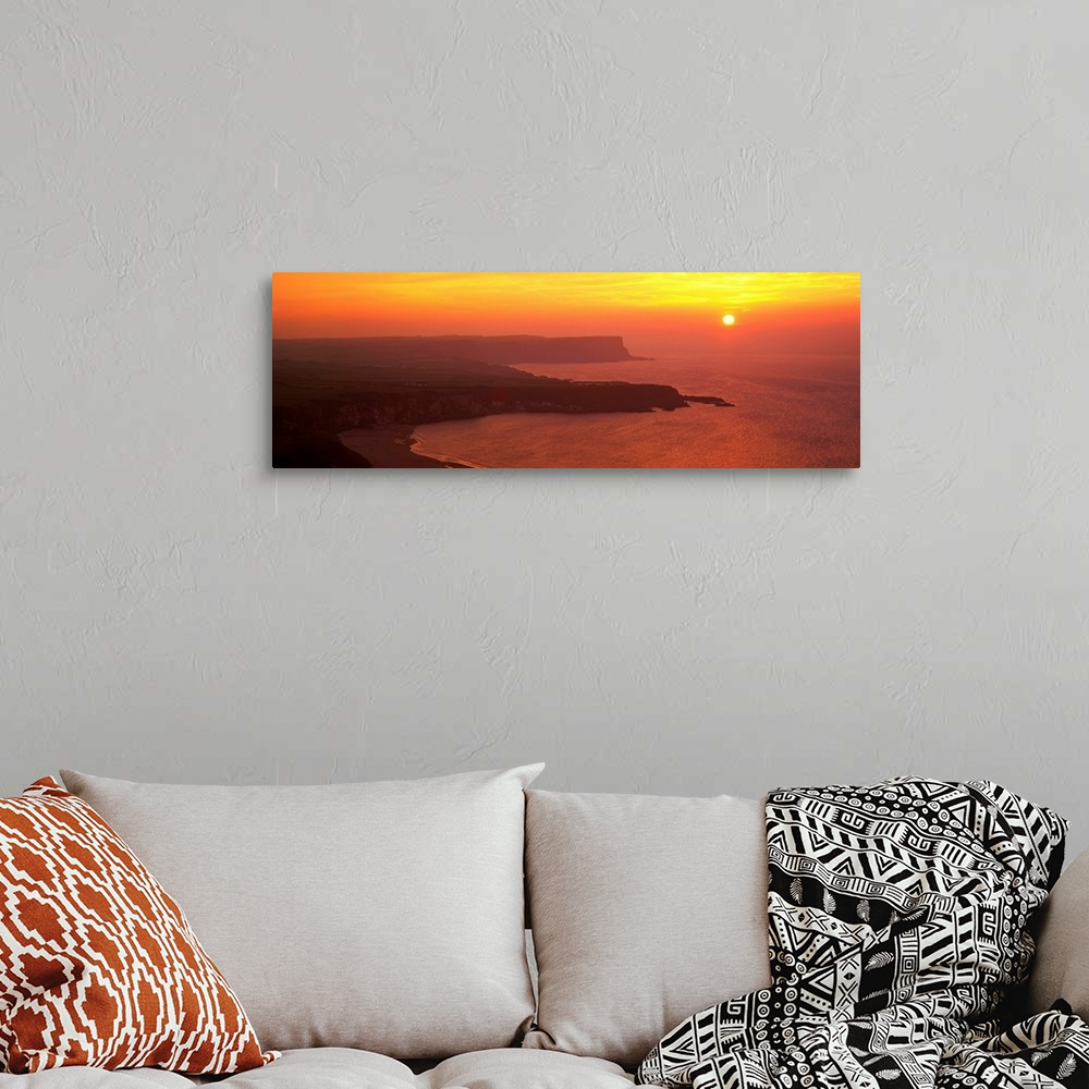 A bohemian room featuring Sunset Benbane Head Antrim Coast Northern Ireland