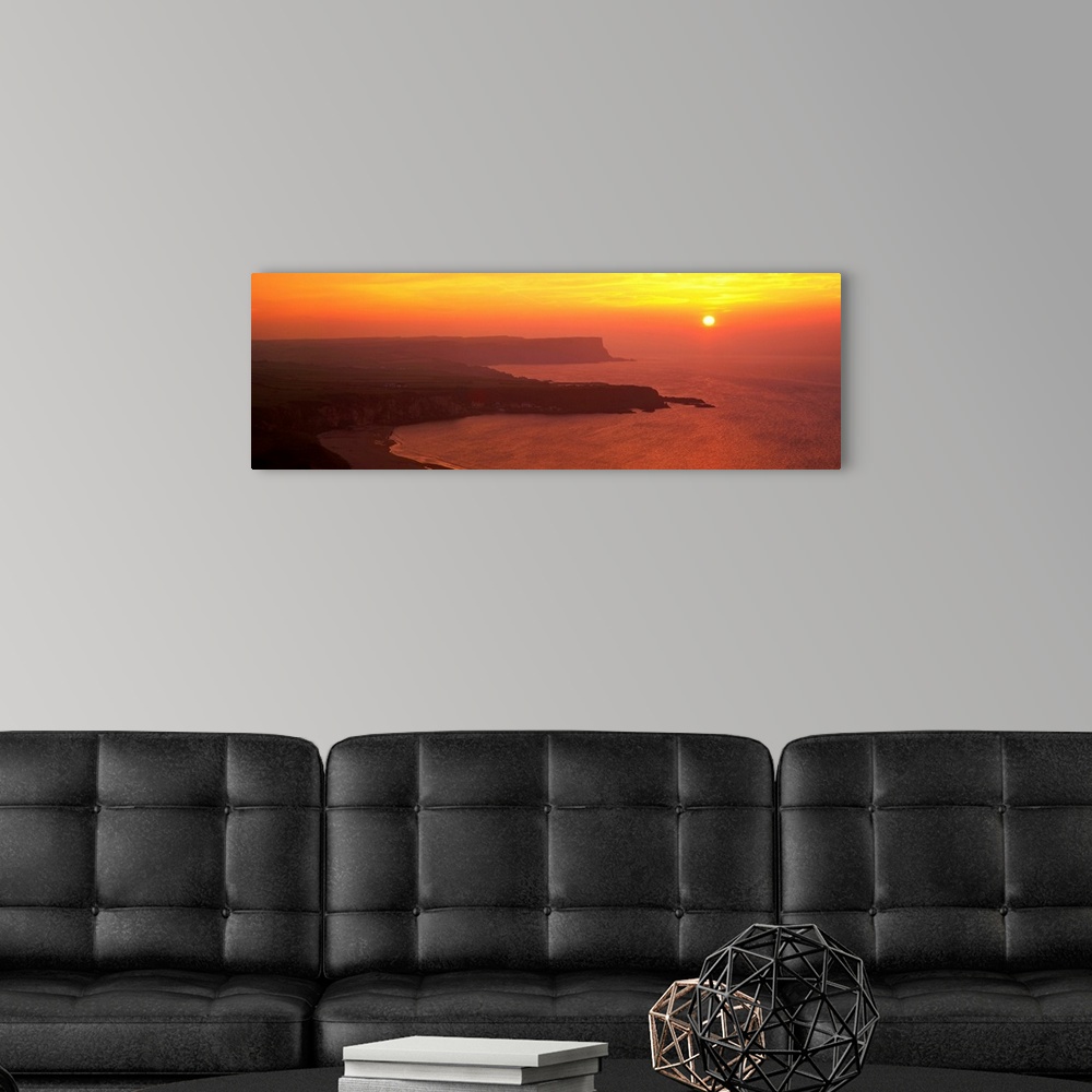 A modern room featuring Sunset Benbane Head Antrim Coast Northern Ireland