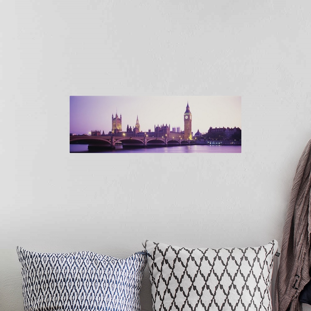 A bohemian room featuring Panoramic photo of Big Ben off in the distance at sunset with a bridge in the foreground.