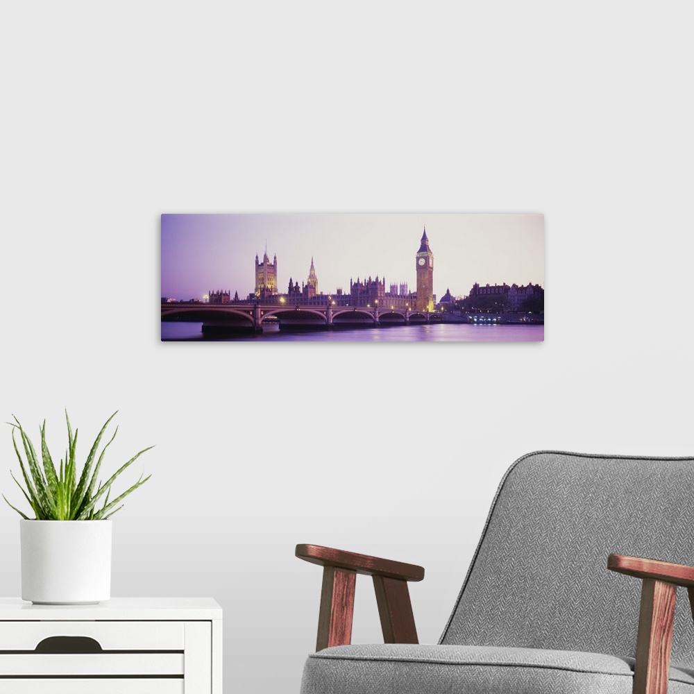 A modern room featuring Panoramic photo of Big Ben off in the distance at sunset with a bridge in the foreground.