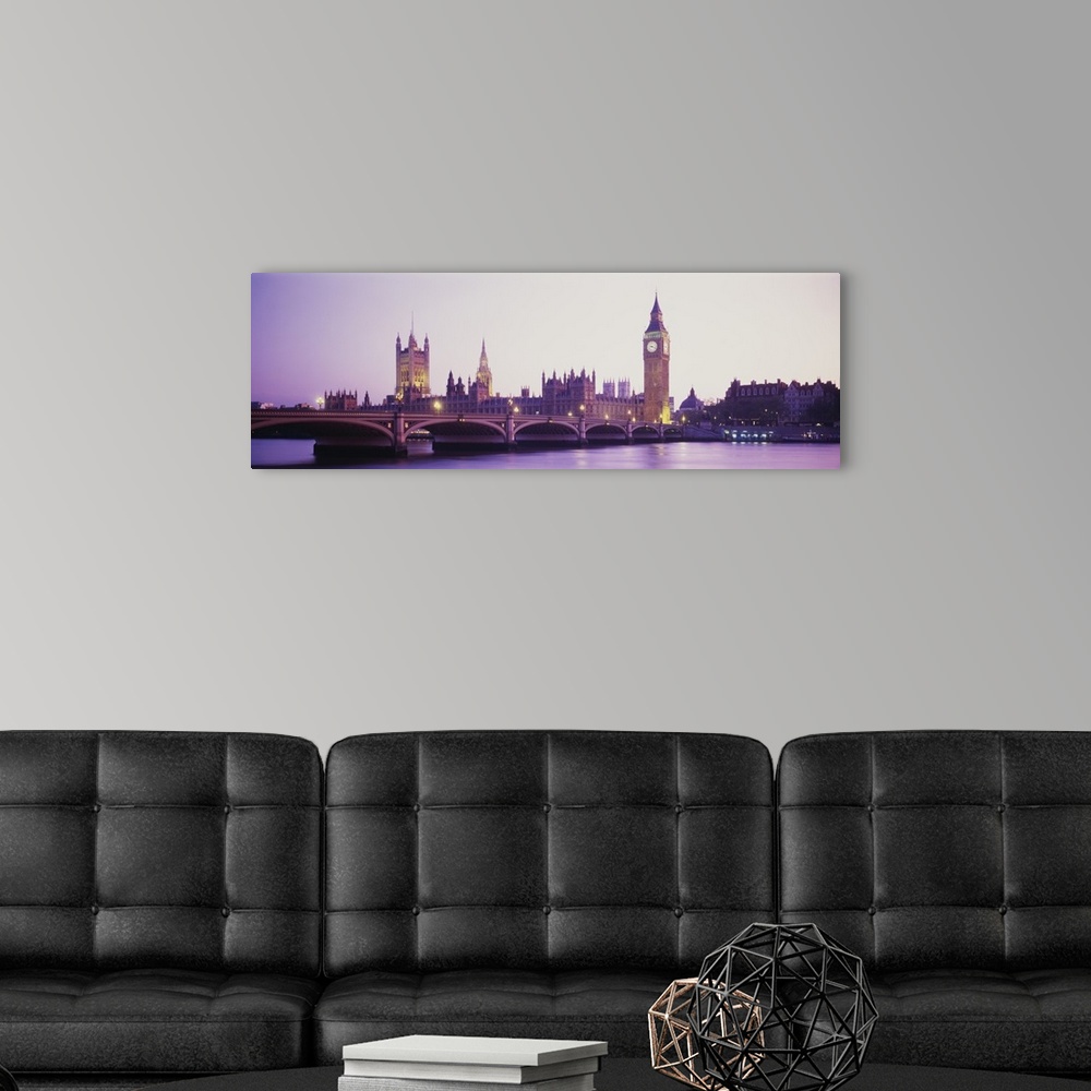 A modern room featuring Panoramic photo of Big Ben off in the distance at sunset with a bridge in the foreground.