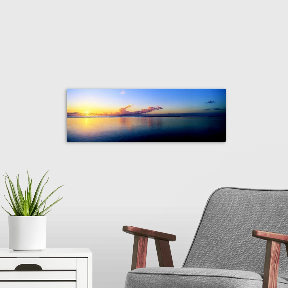 A modern room featuring Sunset Caribbean Sea