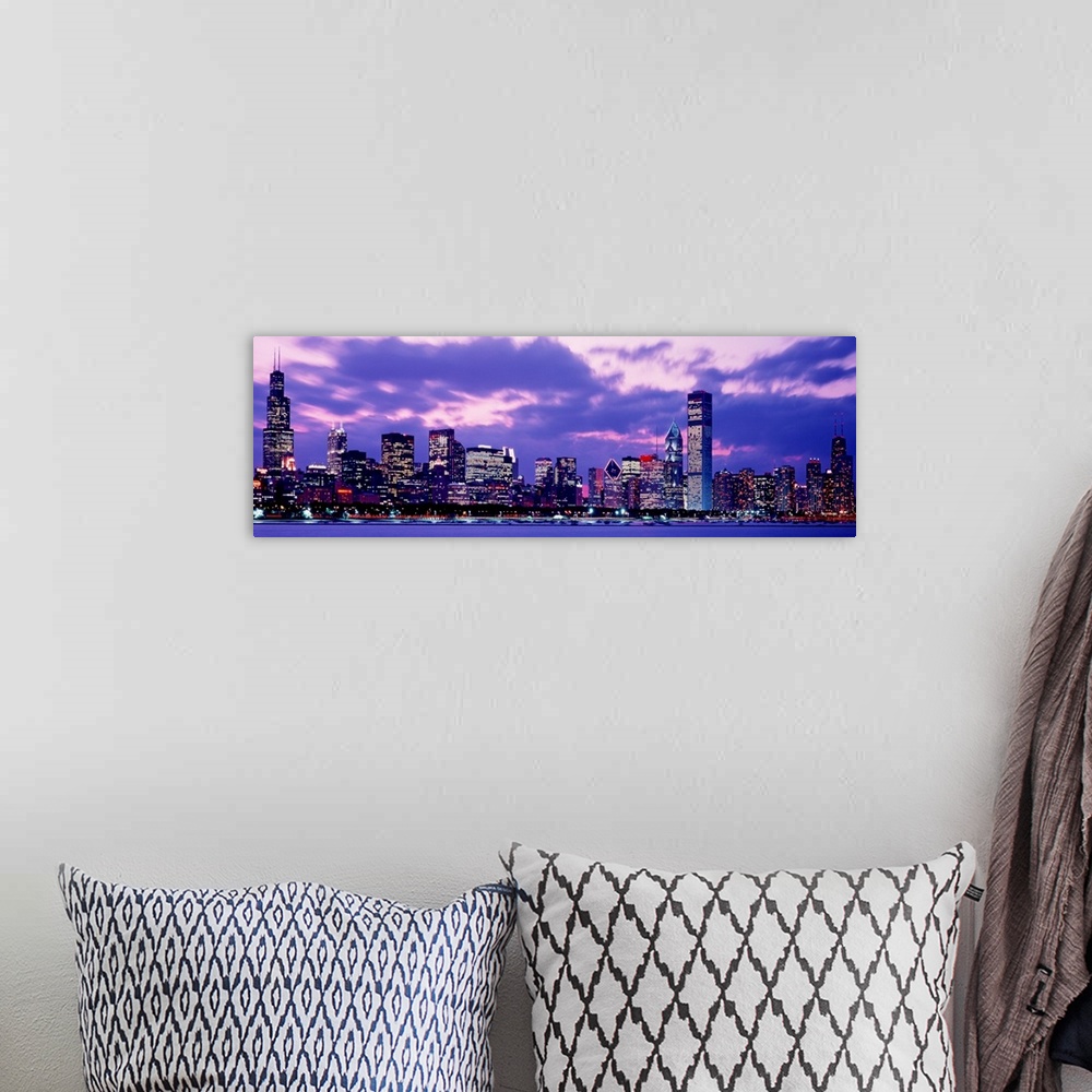 A bohemian room featuring A panoramic landscape photograph taken from on Lake Michigan of the city skyscrapers.