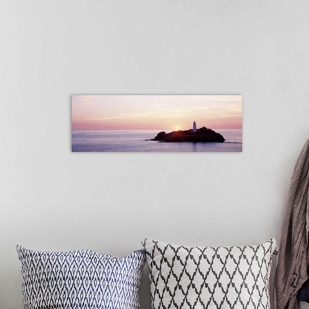 A bohemian room featuring Sunset Godrevy Lighthouse Cornwall England