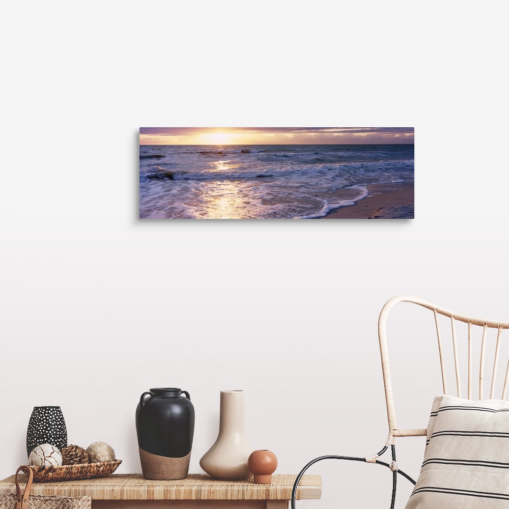 A farmhouse room featuring Panoramic photograph of a sunset on a sandy beach in the Gulf of Mexico located within Florida.  ...