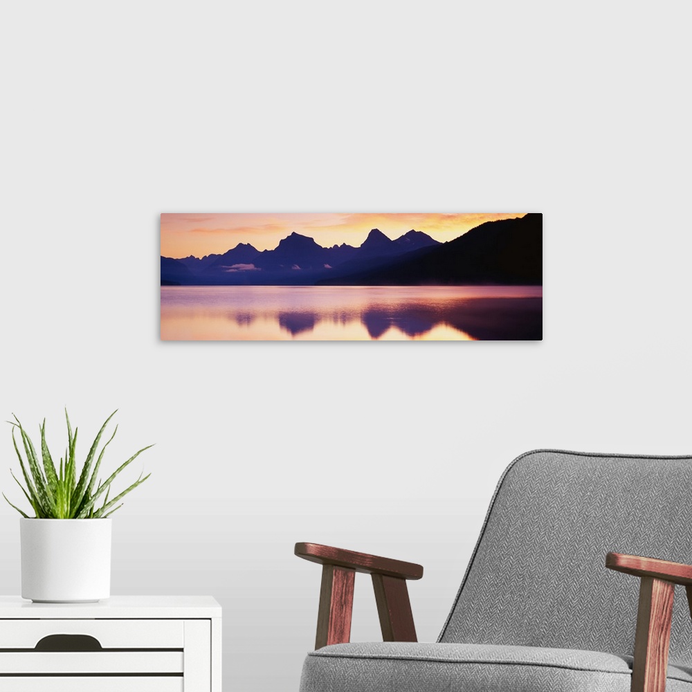 A modern room featuring Sunset Lake McDonald Glacier National Park MT