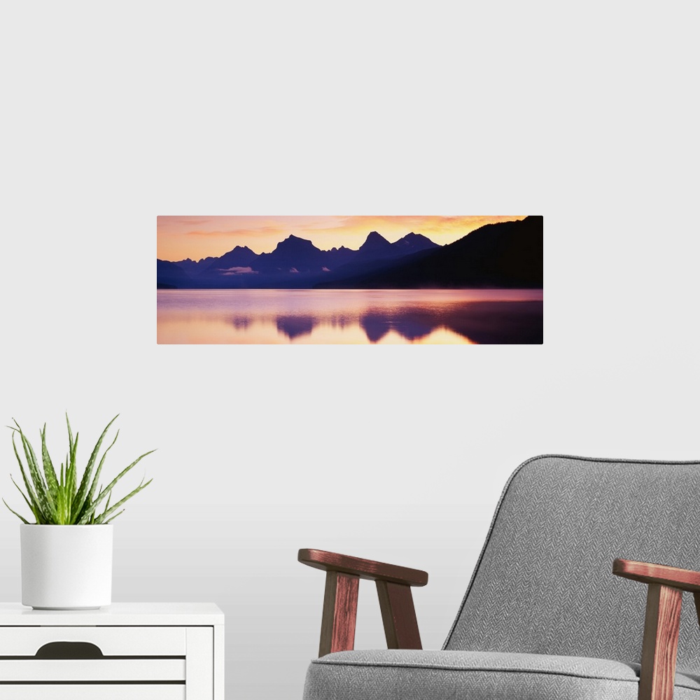 A modern room featuring Sunset Lake McDonald Glacier National Park MT