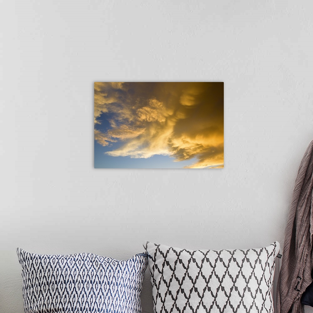 A bohemian room featuring Sunset Light On Clouds