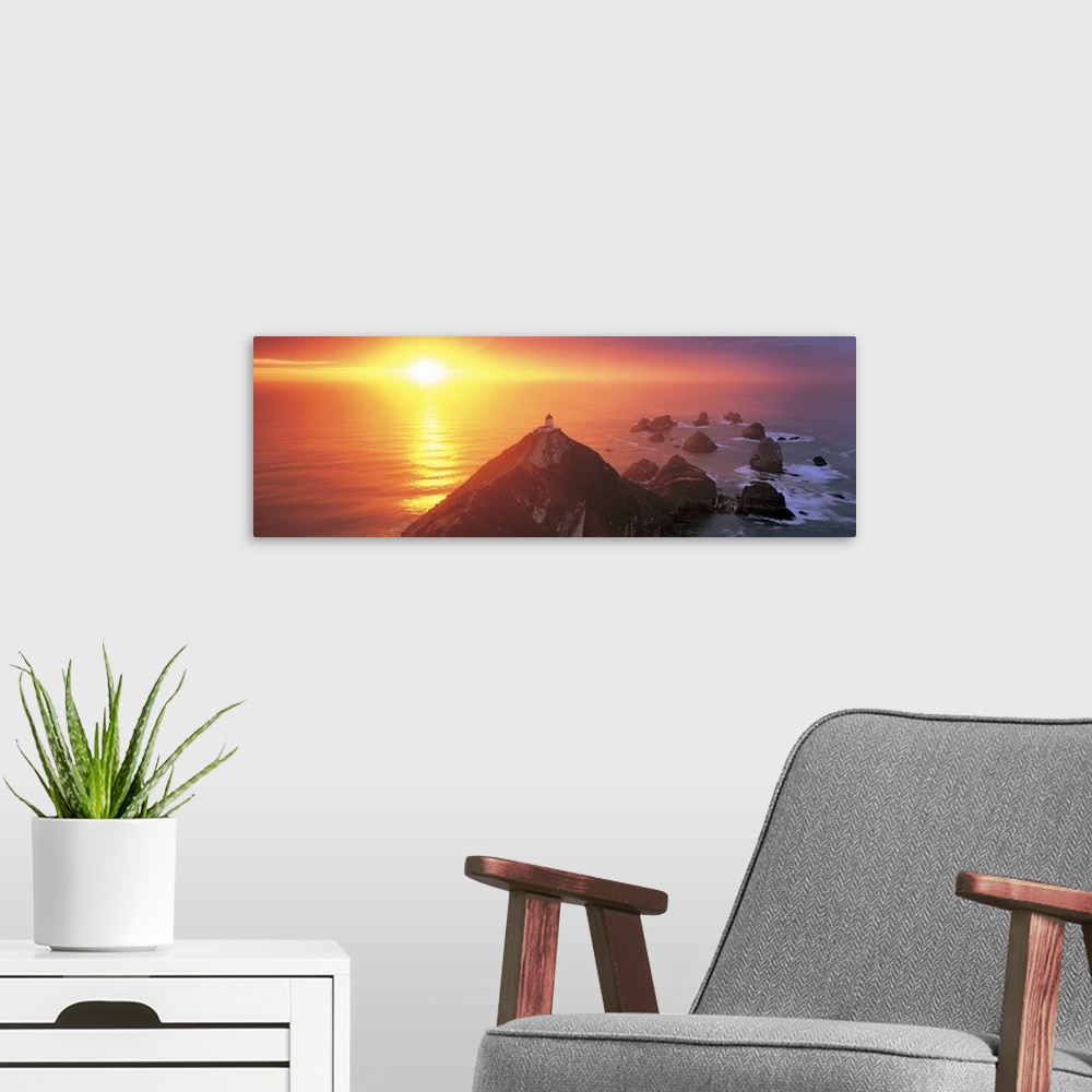 A modern room featuring Sunset Nugget Point Lighthouse New Zealand