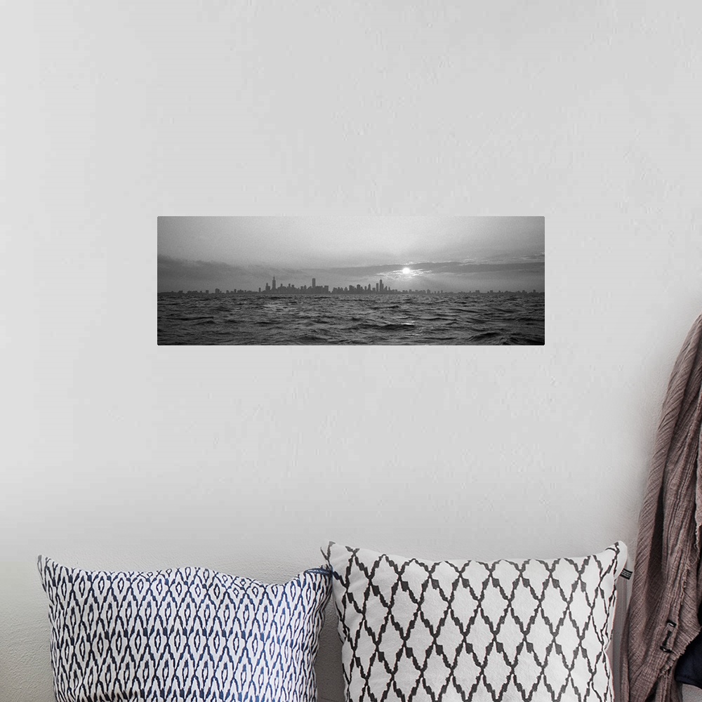A bohemian room featuring Wide angle photograph of sunset over choppy waters of Lake Michigan, the Chicago skyline in the d...