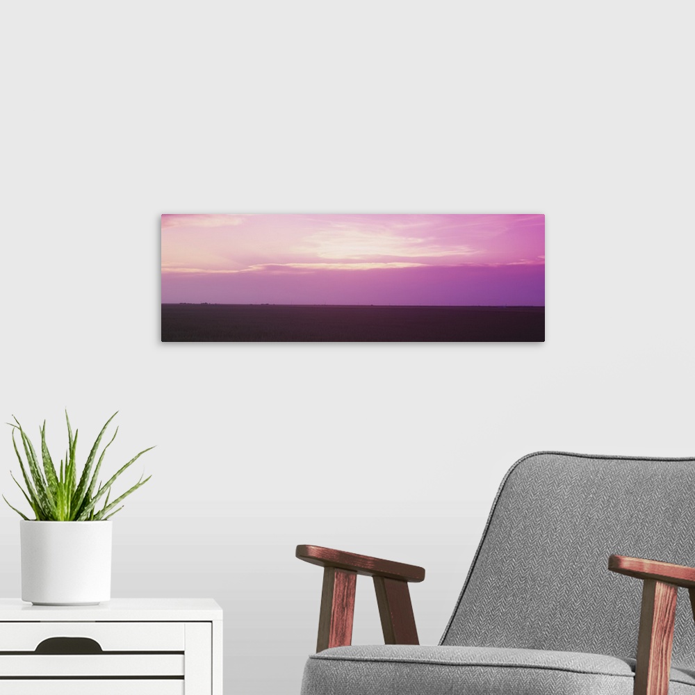A modern room featuring Sunset over a grain field, Carson County, Texas Panhandle, Texas