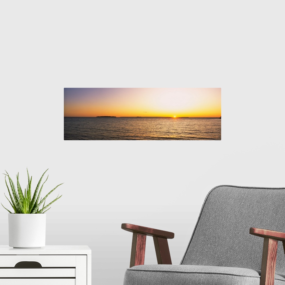 A modern room featuring Sunset over a lake, Lake Michigan, Door County, Wisconsin