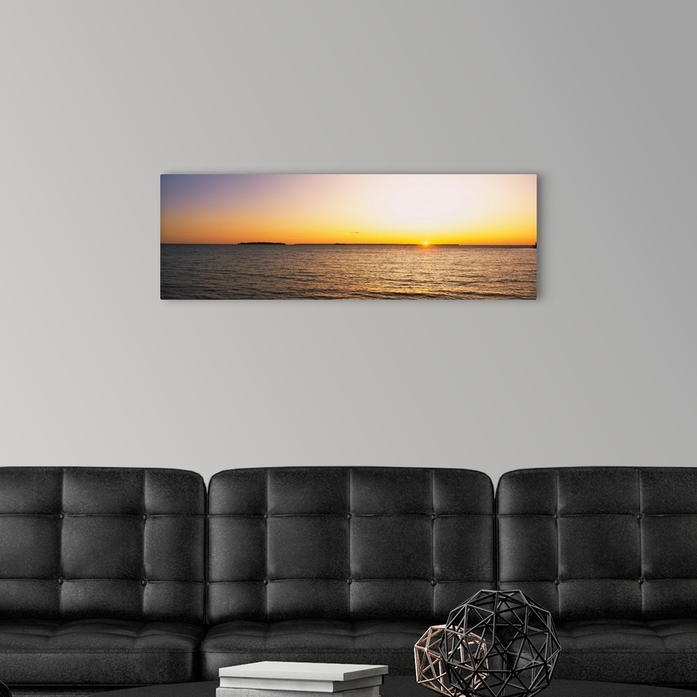 A modern room featuring Sunset over a lake, Lake Michigan, Door County, Wisconsin
