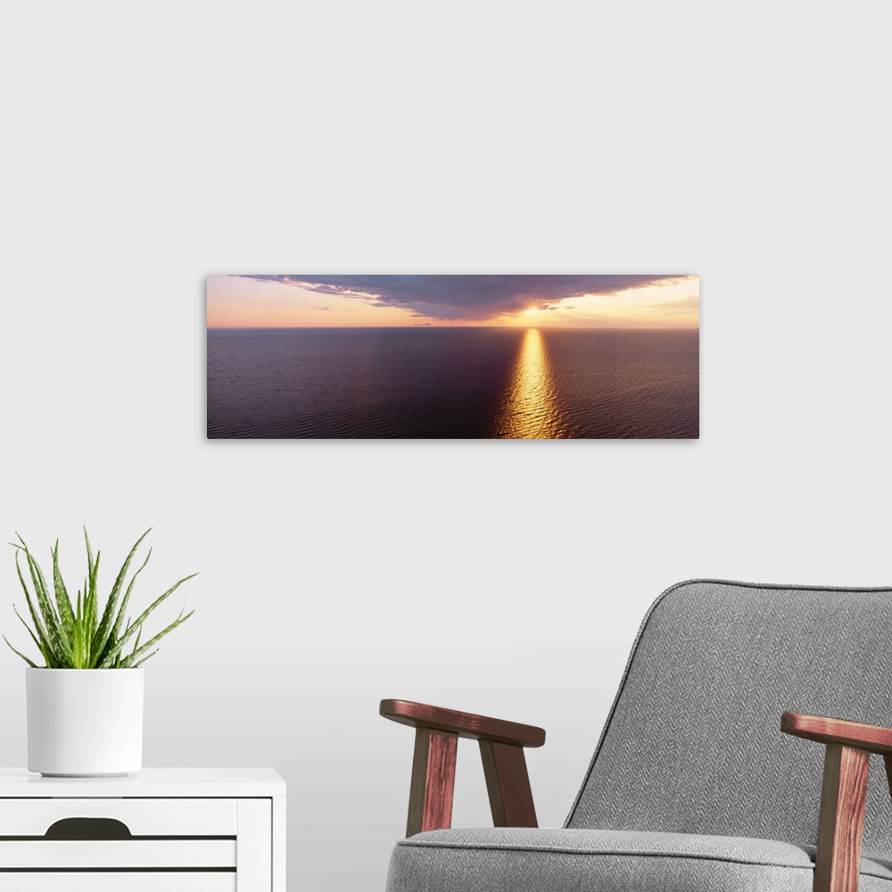 A modern room featuring Sunset over a lake, Lake Michigan, Michigan