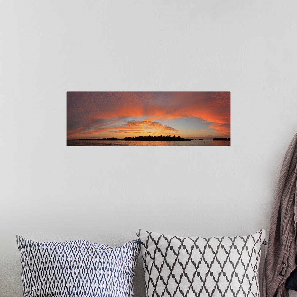 A bohemian room featuring Sunset over a lake, Lake Minnetonka, Minnesota