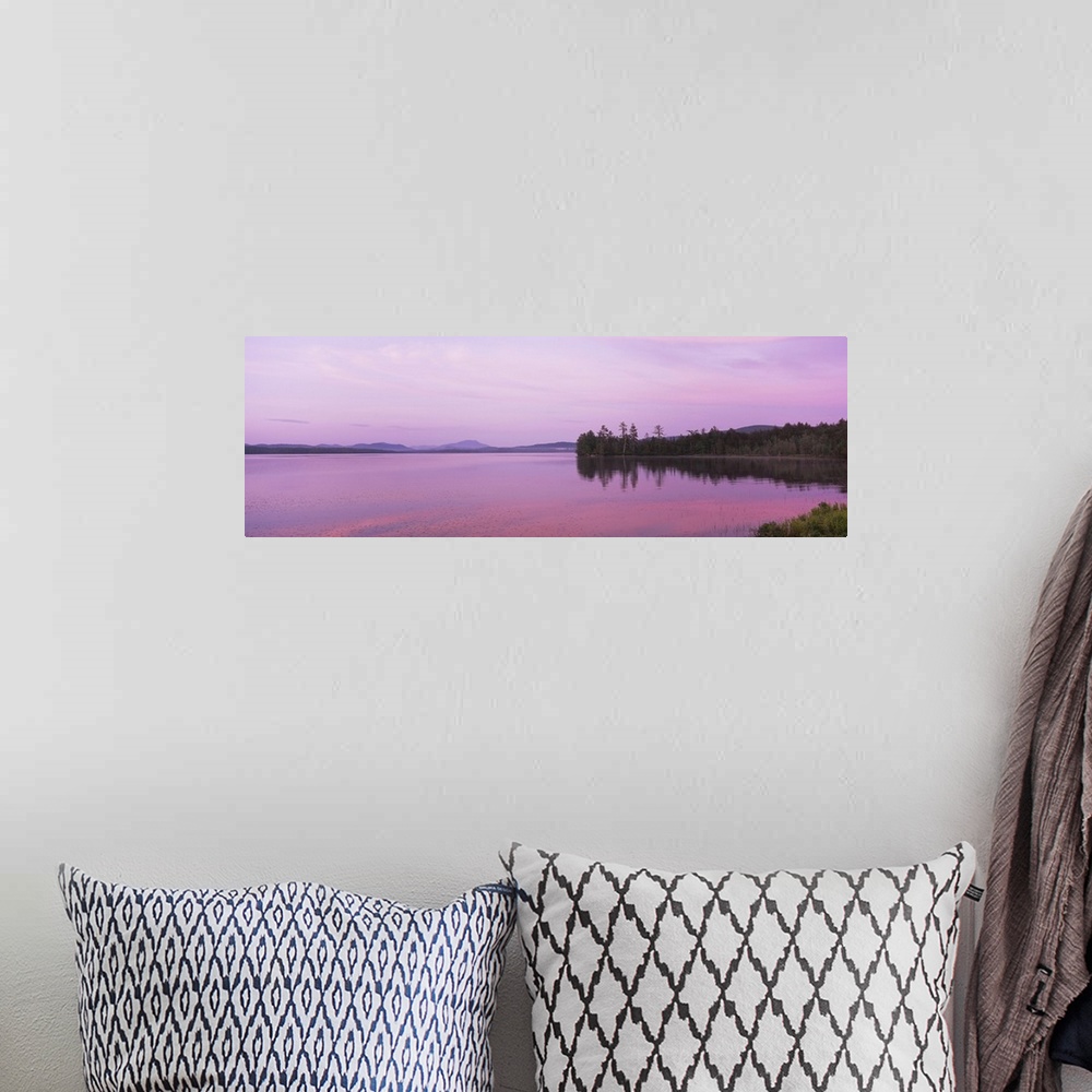 A bohemian room featuring Sunset over a lake, Raquette Lake, Adirondack Mountains, New York State
