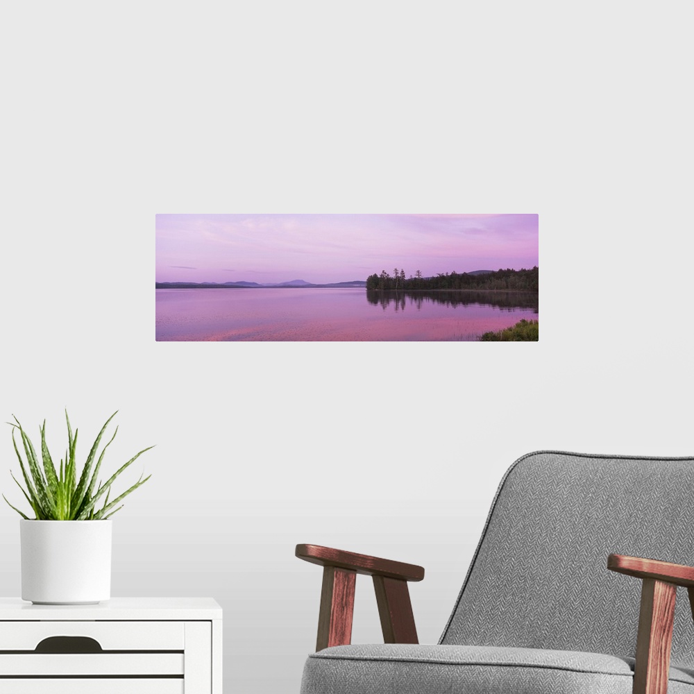 A modern room featuring Sunset over a lake, Raquette Lake, Adirondack Mountains, New York State