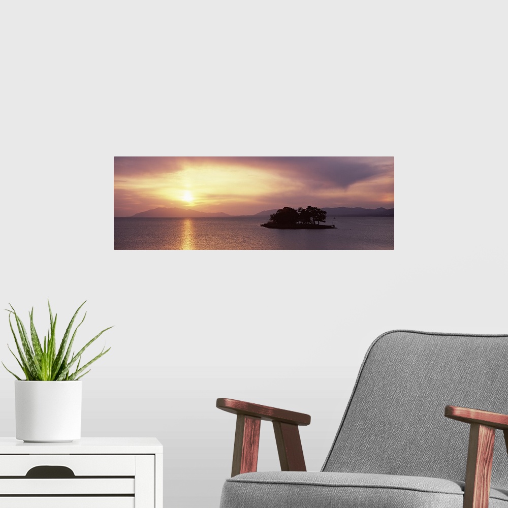 A modern room featuring Sunset over a lake, Yomegashima Island, Lake Shinji, Matsue, Shimane Prefecture, Chugoku Region, ...