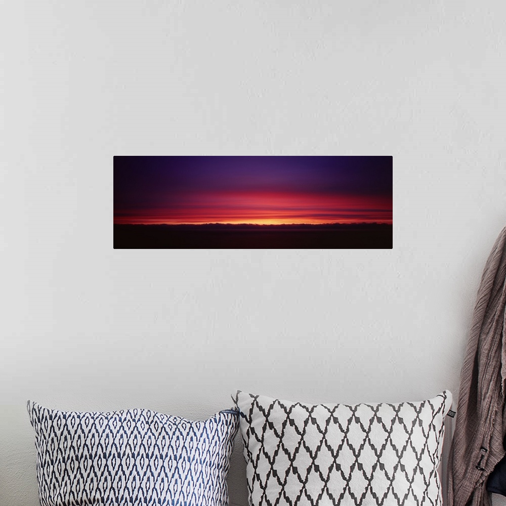 A bohemian room featuring Sunset over a landscape, Big Sur, California