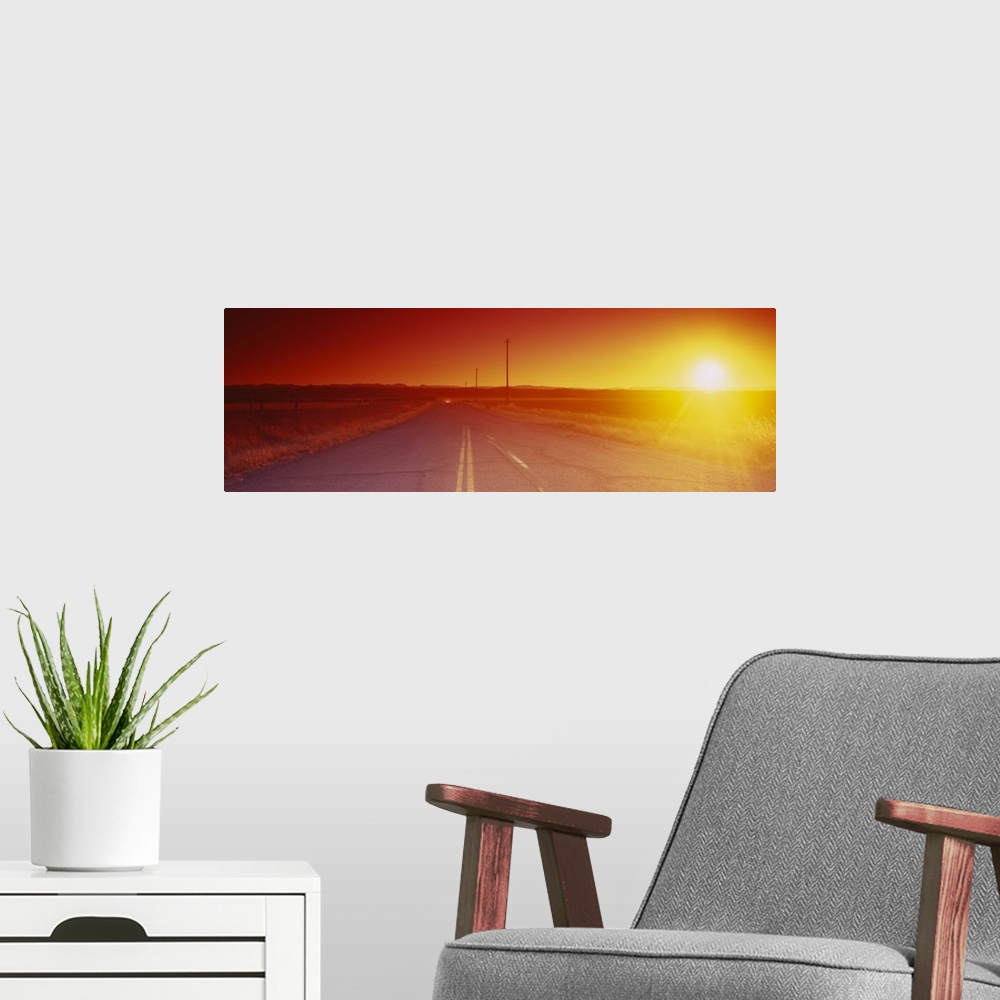 A modern room featuring Sunset over a landscape, Yolo County, California