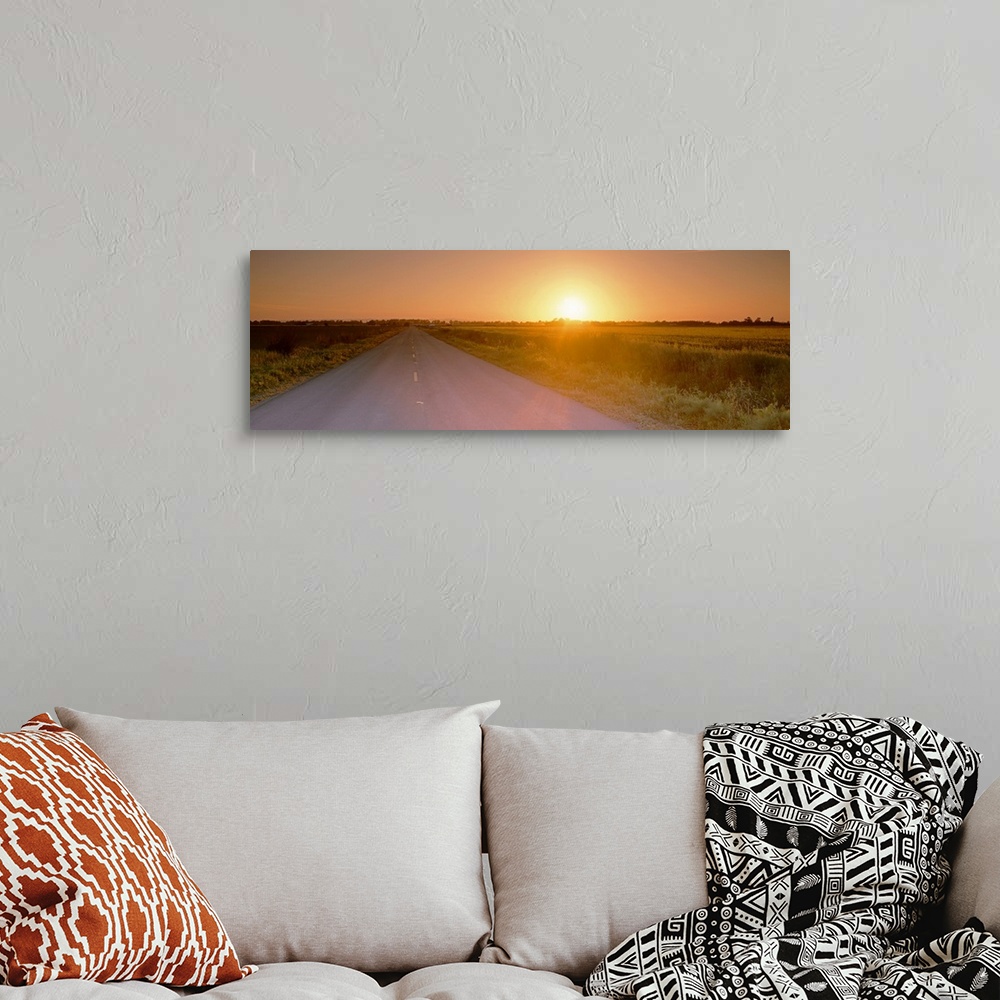 A bohemian room featuring Sunset over a road, Sacramento County, California