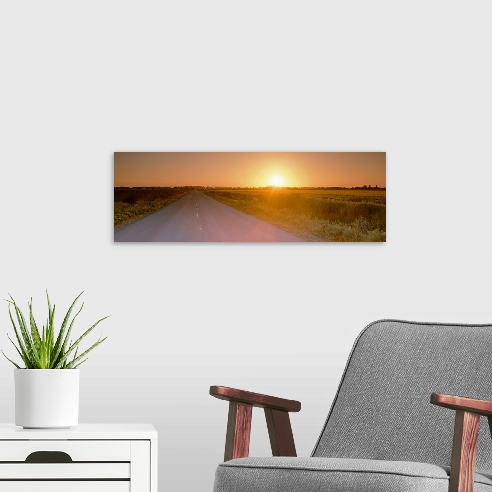 A modern room featuring Sunset over a road, Sacramento County, California