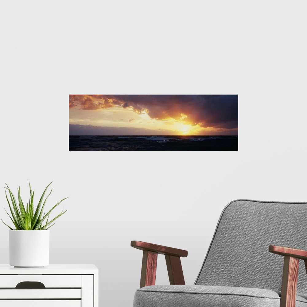 A modern room featuring Sunset over a sea, Gulf of Mexico, Venice Beach, Venice, Florida