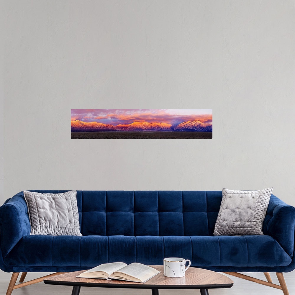 A modern room featuring Sunset over mountain range, Sangre De Cristo Mountains, Taos, Taos County, New Mexico, USA
