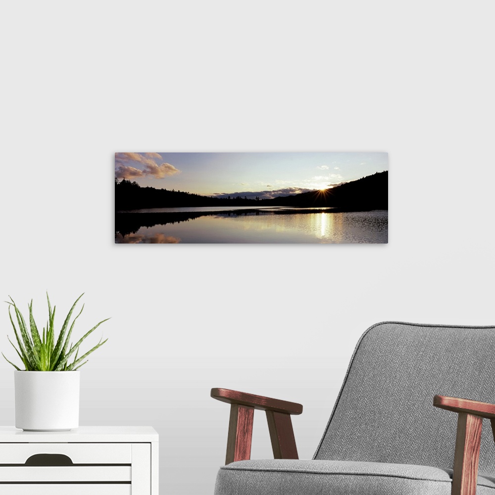 A modern room featuring Sunset over mountains, Upper Brown Tract Pond, Adirondack Mountains, New York State,