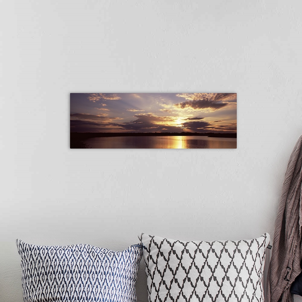 A bohemian room featuring Sunset over the Ocean, Amelia Island, Nassau County, Florida, USA