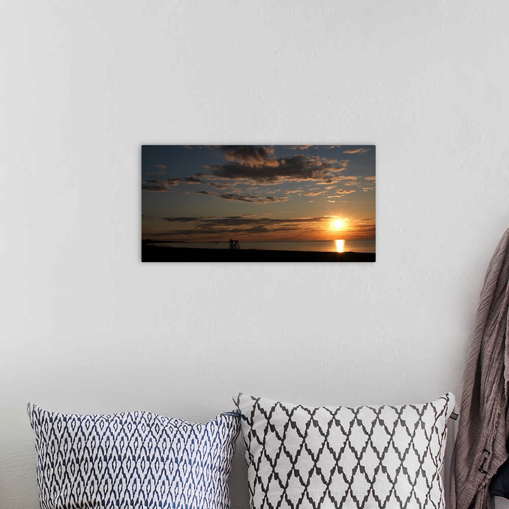 A bohemian room featuring Sunset over the ocean, Jetties Beach, Nantucket, Massachusetts