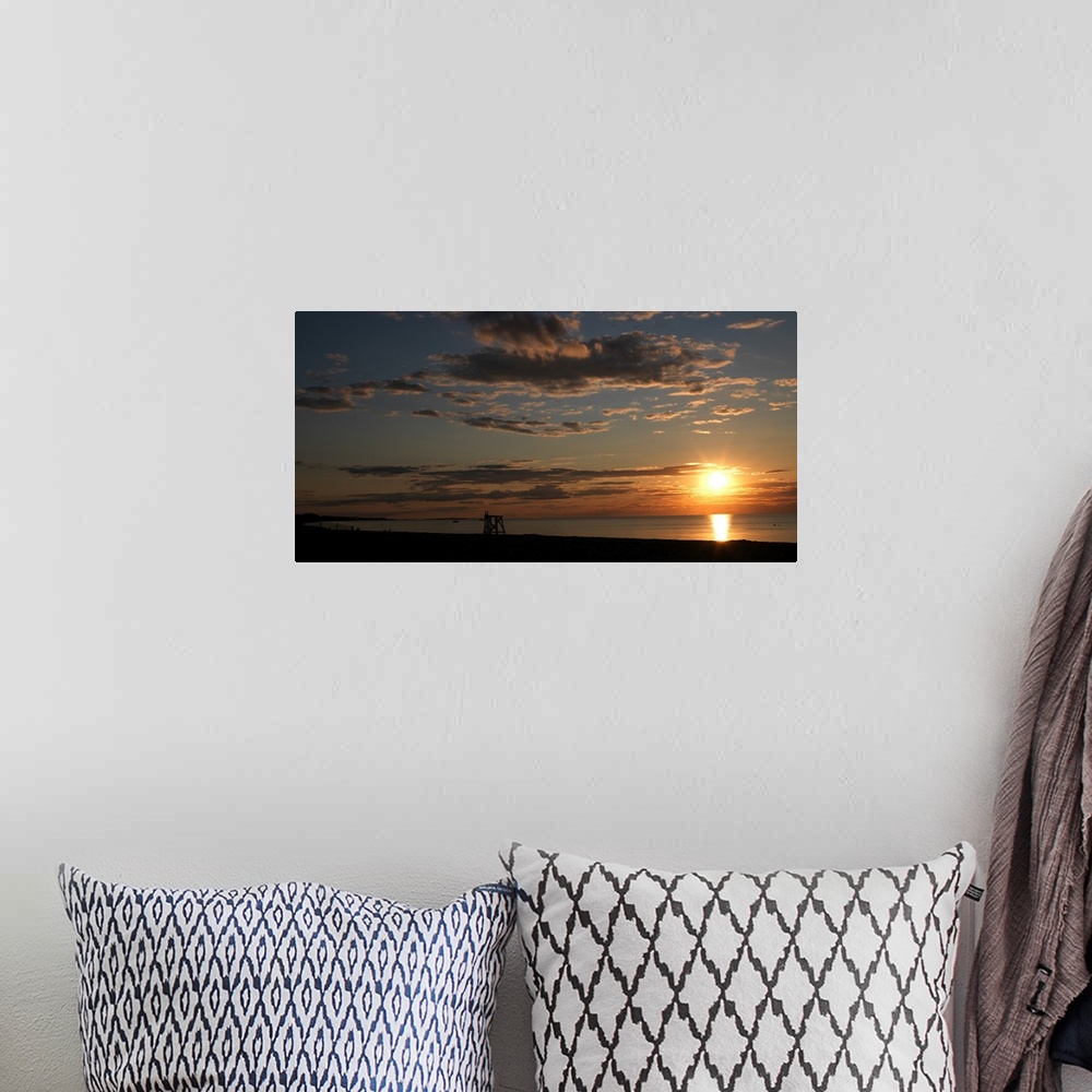 A bohemian room featuring Sunset over the ocean, Jetties Beach, Nantucket, Massachusetts